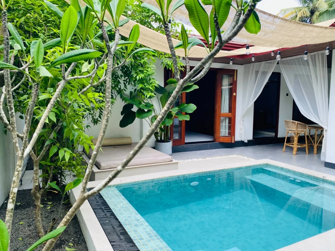 Villa Araliya private sunlit veranda and tropical foliage